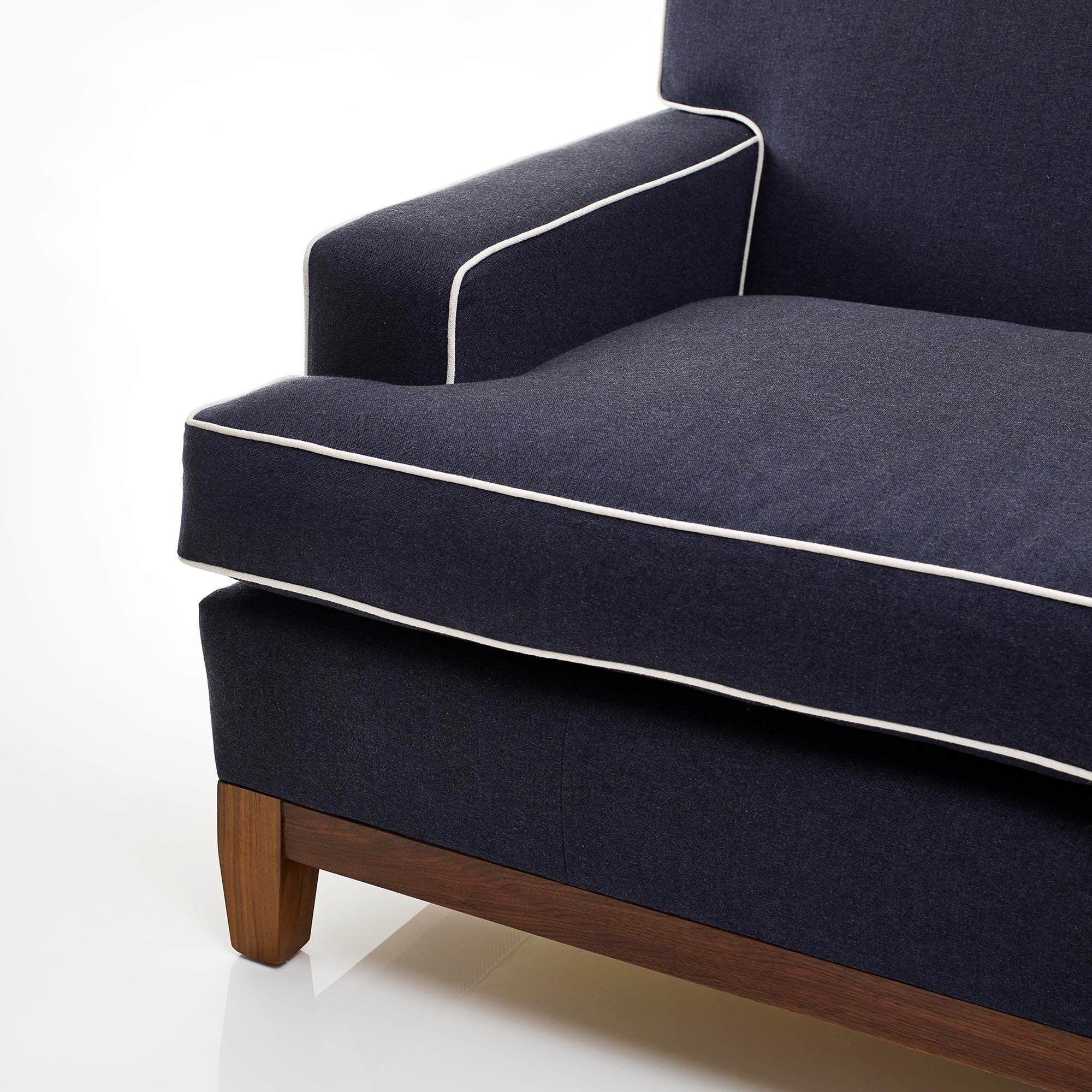 Navy blue couch with deals white piping